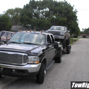 my dually pullin my f1 to the mud hole